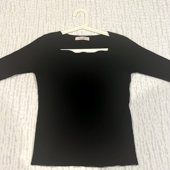 Black soft sweater made in Korea. Cute neck and cuff design. - Picture 1 of 6